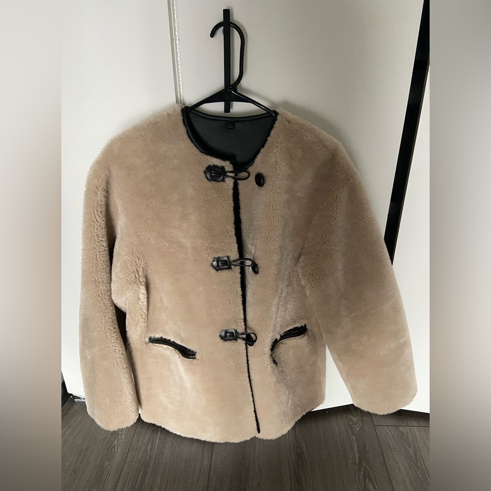 Mango Fur-effect coat with appliqués
